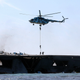 Illustration for article titled Iran Blows Up Gigantic U.S. Carrier Mock-Up During Naval Exercise